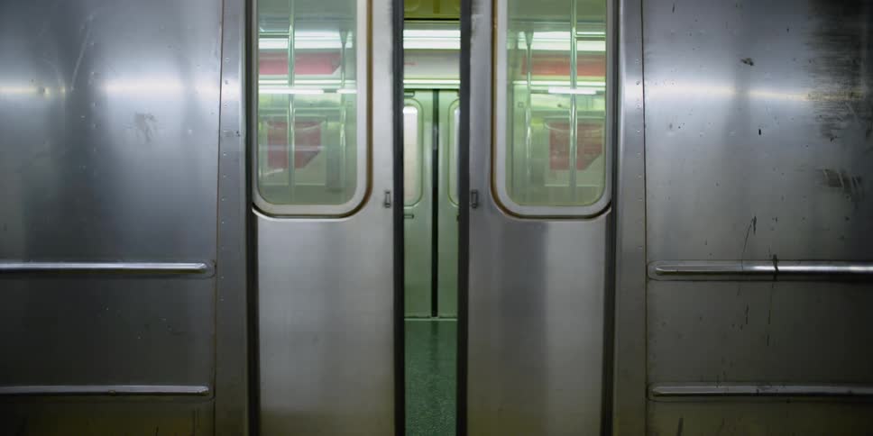 A subway car doors close