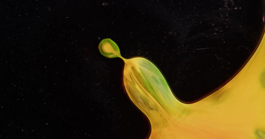 Yellow and green fluid retreats from black leaving a nodule