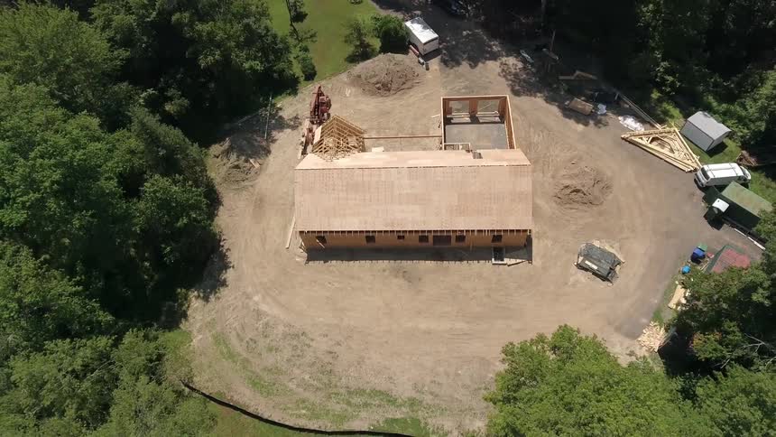 A partially built house in the woods