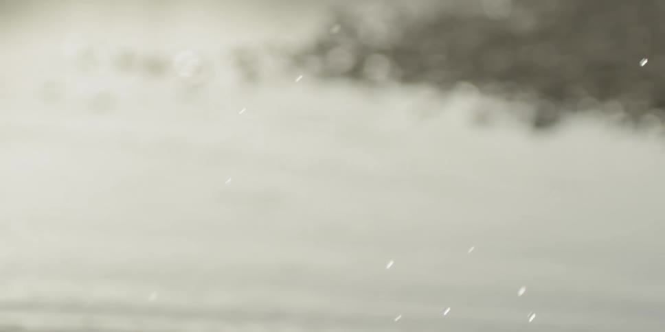 Rowing paddle splashing in water