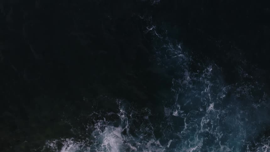 The view is of the ocean in the middle of the day time