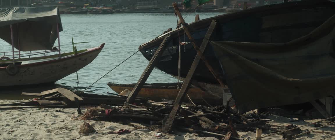 Boats docked on the shore