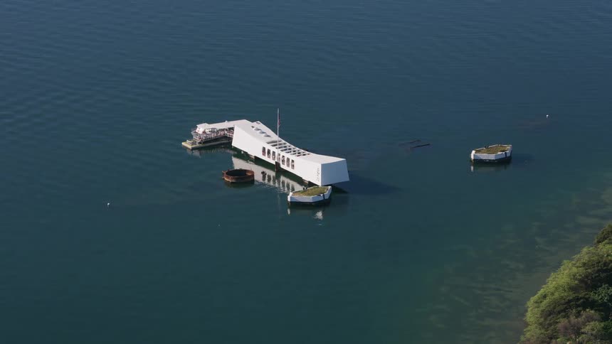 Series of manmade islets sit off the coast and near buildings built on water