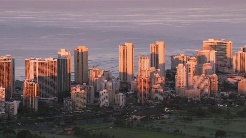 Aerial view of a downtown city near the ocean coastline
