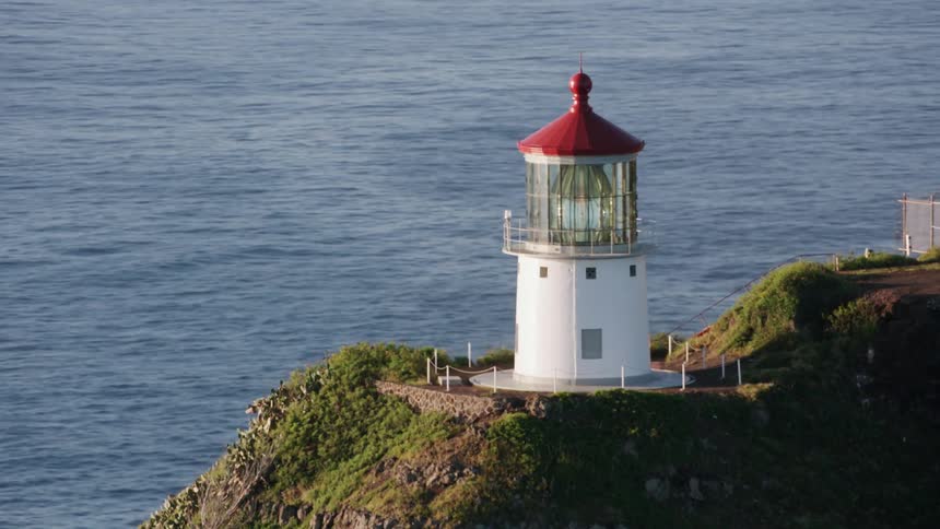 A small lighthouse in the middle of a mountain