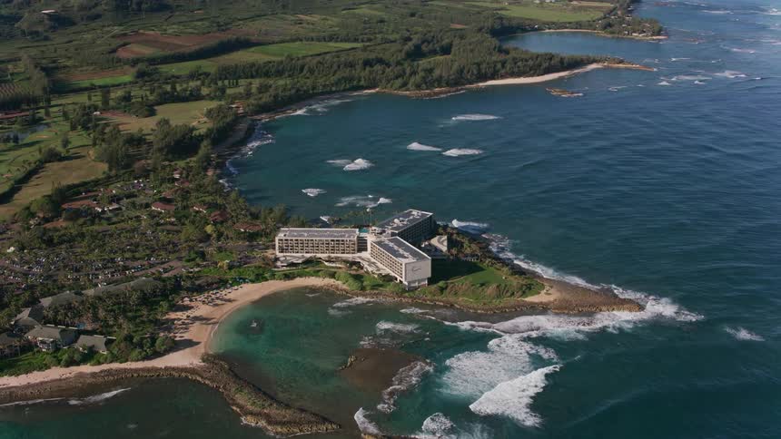 Waves roll into shore at the turtle bay resort on the coast of oahu