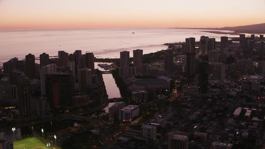 The sun is rising on the city