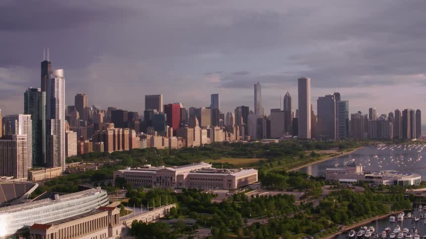 Aerial view of marina stadium and city skyline next to public park