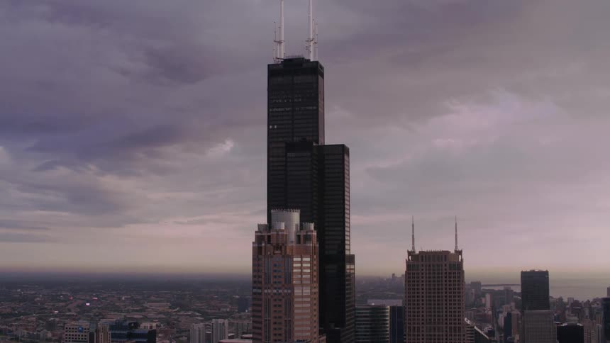 The biggest skyscraper in a large city with antenna on the roof extending its height