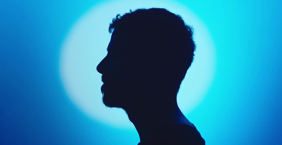 You can only see the silhouette of his head