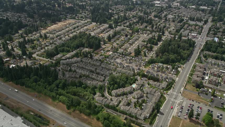 Aerial footage flying over condominiums in Lynnwood Washingtons suburban neighborhood