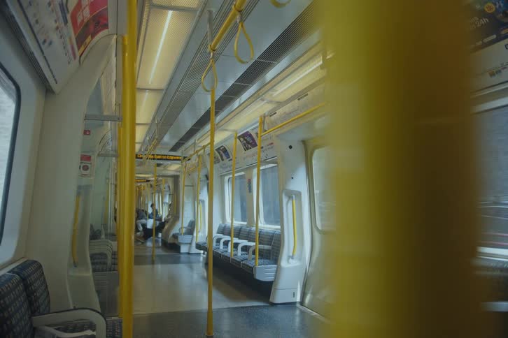 People wait on a stopped train