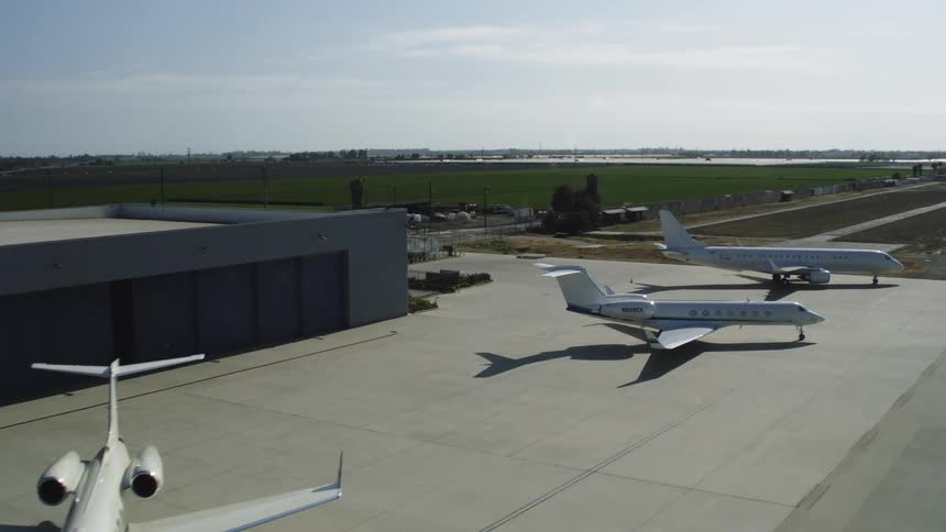Planes are parked at an airport