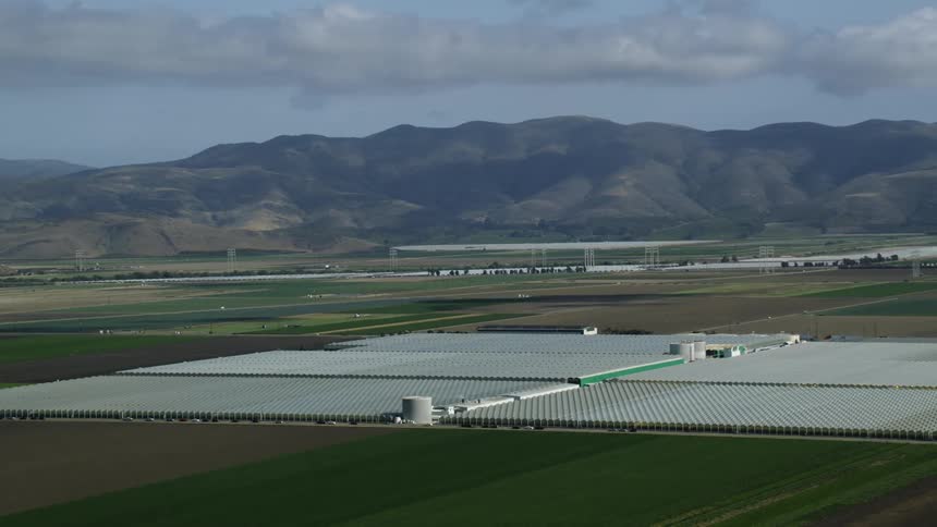 Aerial view of large greenhouse in the field