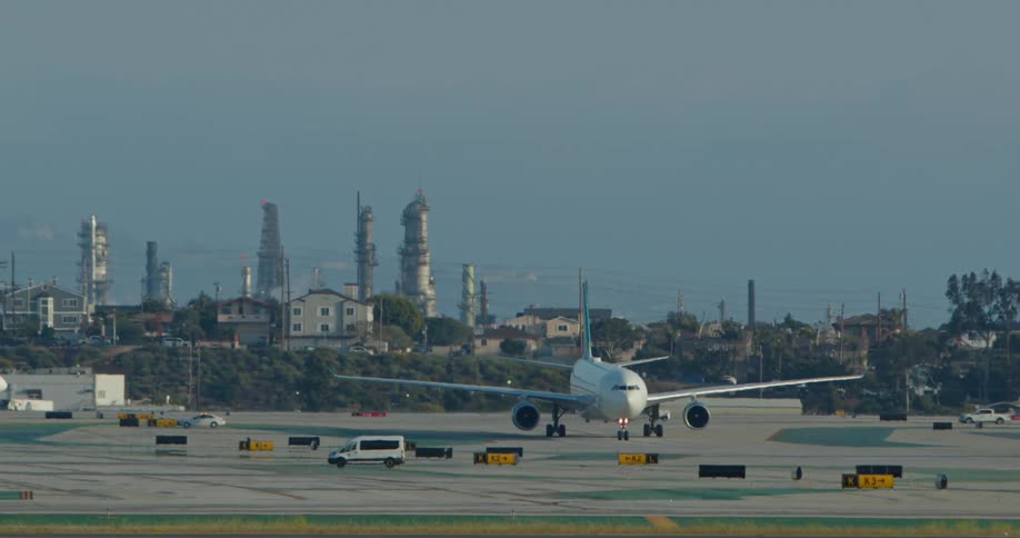 The view is of the airport located downtown in the middle of the day