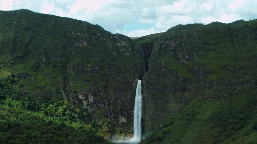 Landscape of waterfall cascading down the mountainside