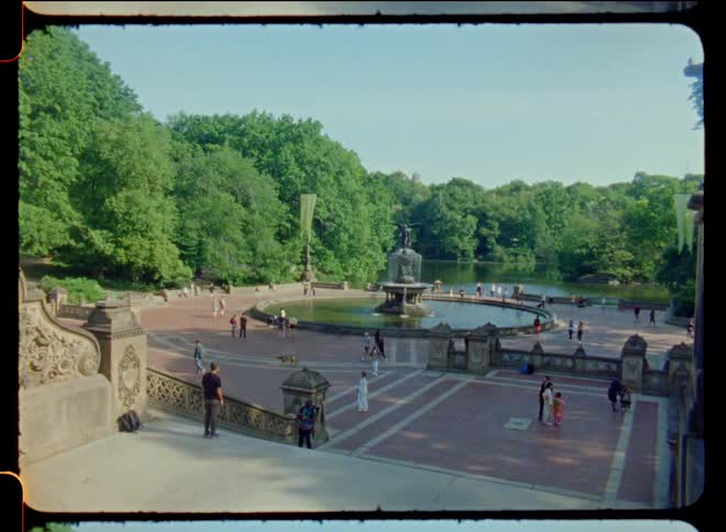 A group of people are outdoors in the middle of the day time