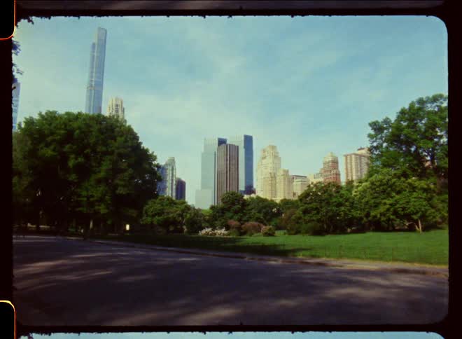 A city park overlooking a block of skyscrapers
