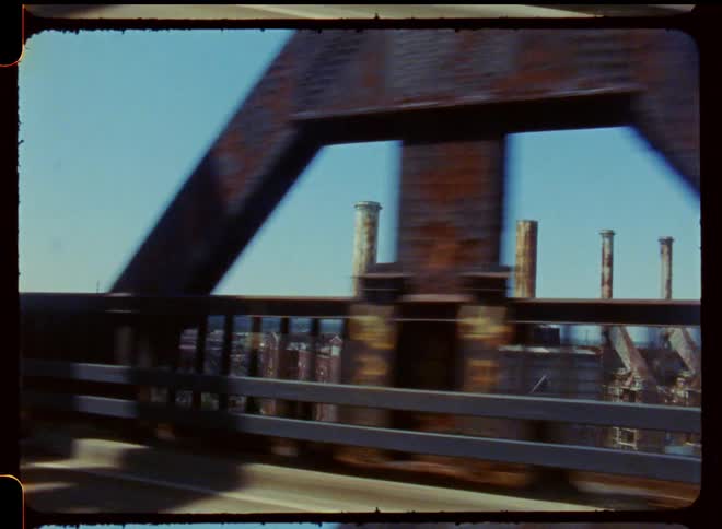 A large factory is off the overpass