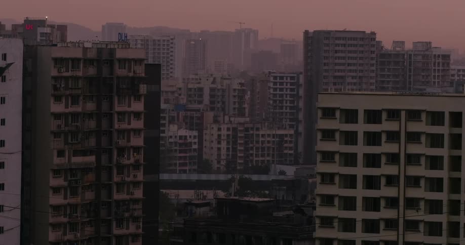 Dilapidated buildings fill a city skyline