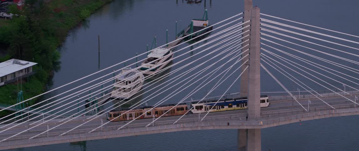 Aerial view of tram crossing golden ears bridge