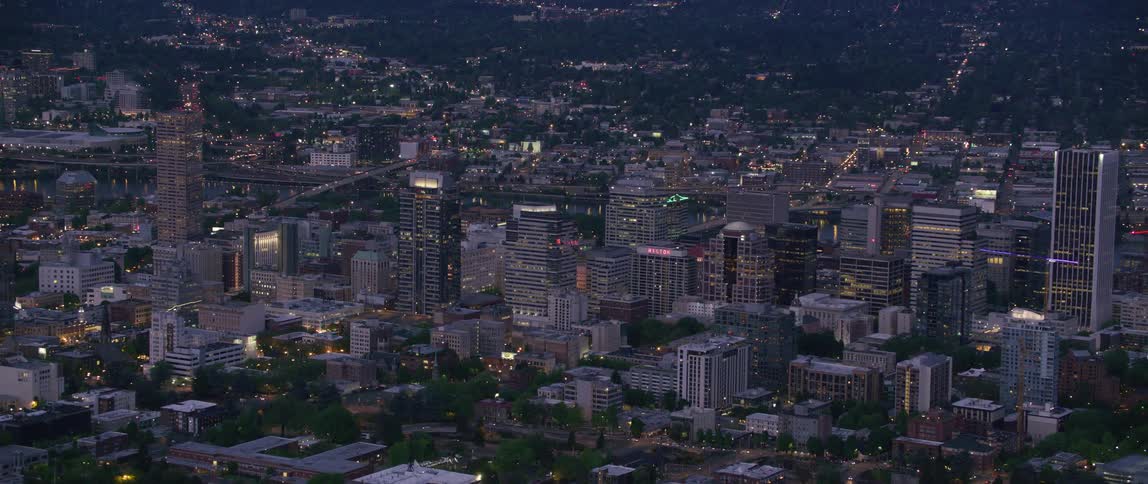A cityscape at night with many city lights turned on