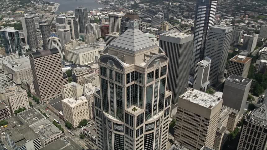 A breathtaking 4K footage tracks the Washington Mutual Tower in downtown Seattle as the drone camera tilts up