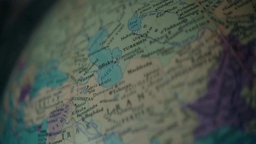 The view is of an atlas and you can see different country names