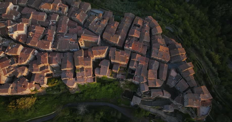 An old village with very tight streets surrounded by a forest