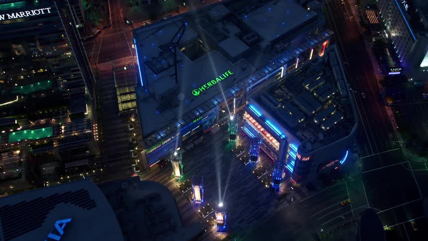 A stunning 4K aerial view of LA Live and downtown Los Angeles at twilight showcasing the metropolis with Sony and Nokia equipment