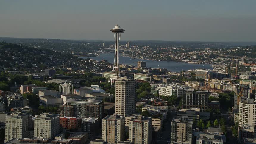 An aerial view of the iconic Seattle Space Needle in downtown Seattle Washington on a sunny day