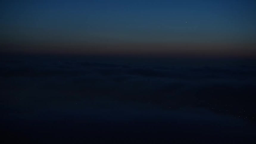 A breathtaking 4K aerial view of the marine layer enveloping Los Angeles California at night