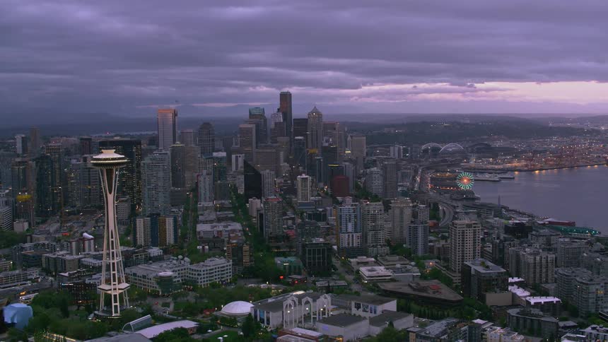 Moving aerial wide shot of the metropolitan area of seattle