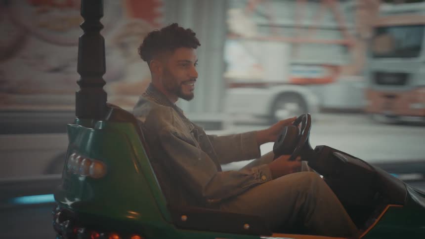 A man is driving a go cart