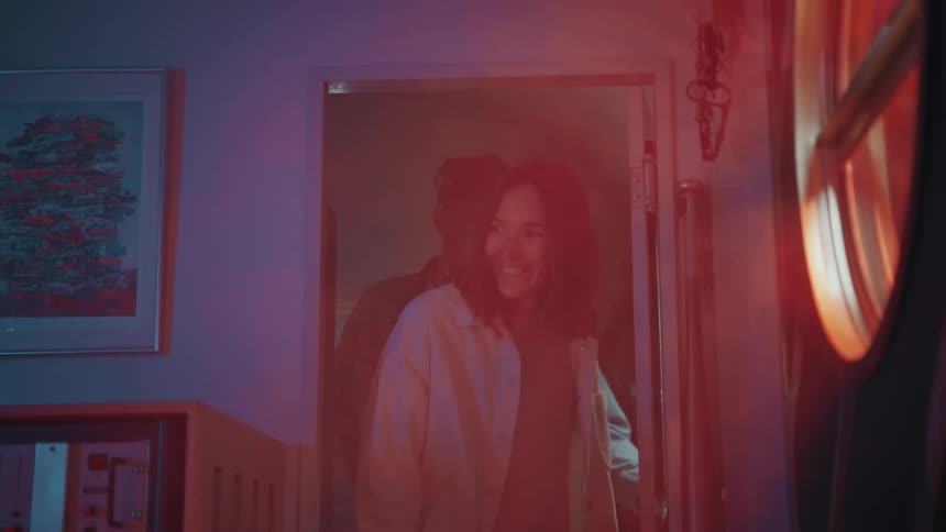 A man and women enter the room