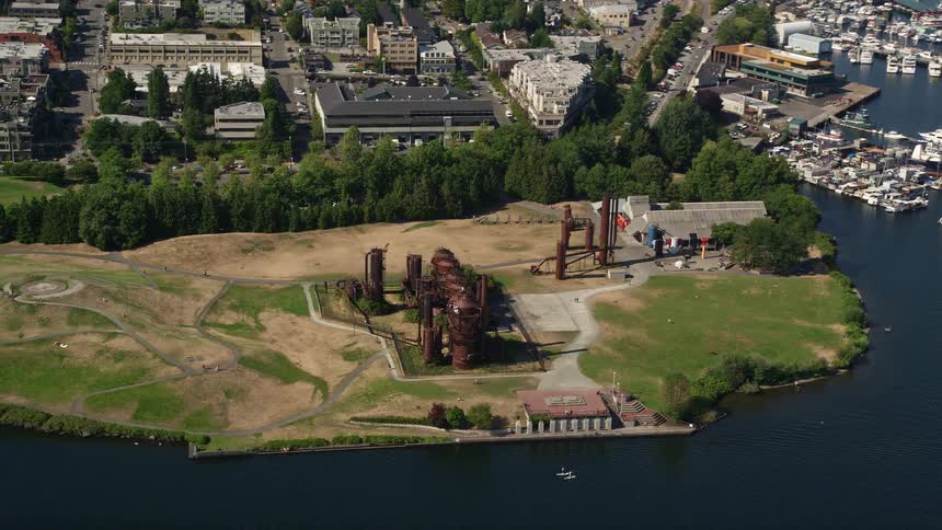 Aerial footage of Gas Works Park by Lake Union in Wallingford Seattle with sunny weather and historical landmarks