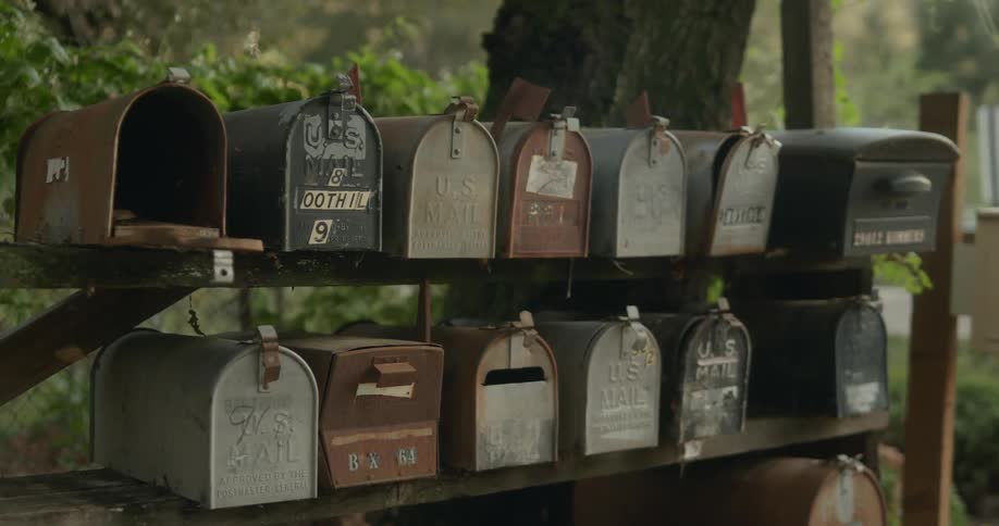 Individual mail boxes are lined up outside a neighborhood