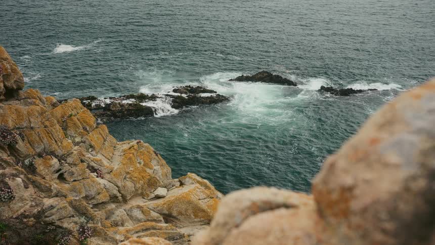 A view of waves crashing near cliffs