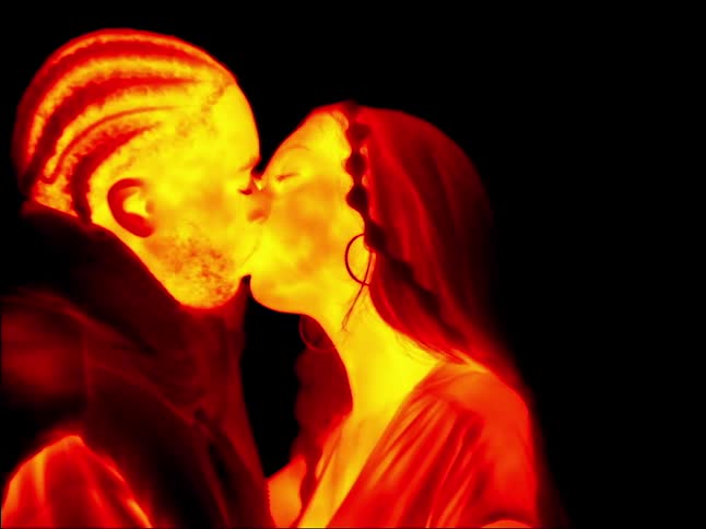 A man and woman make out and kiss