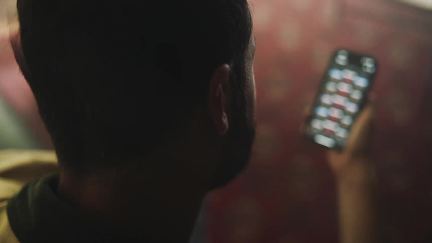 A person is using their cell phone