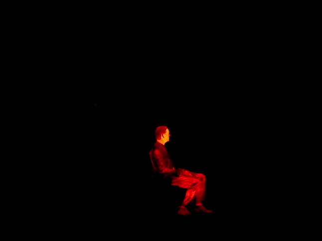 A silhouette of a man with visual effects is displayed