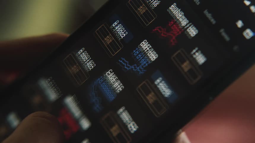 Person scrolls data and graphs on smartphone screen