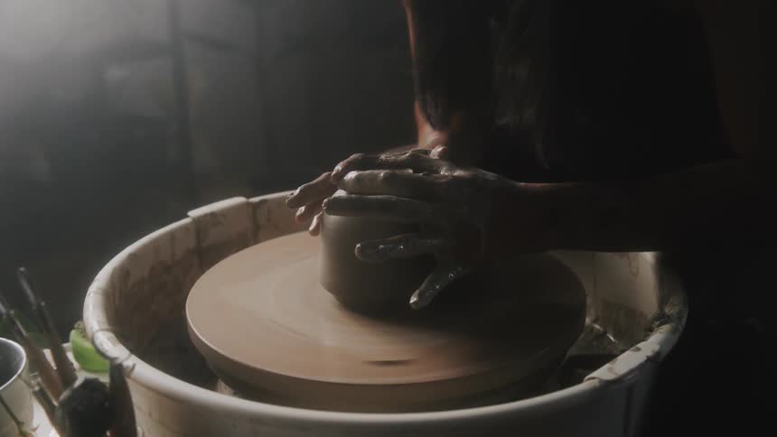The view is if someone using clay and doing pottery