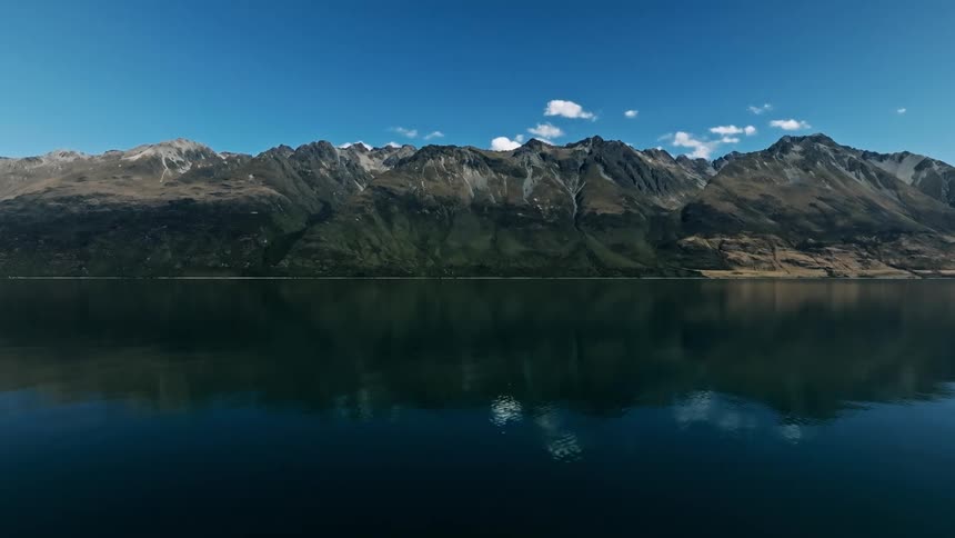 A mountain range reflected in the pristine below