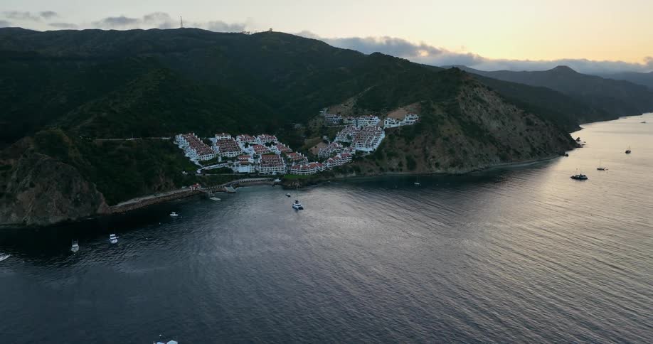 Boats are around the shoreline of the town