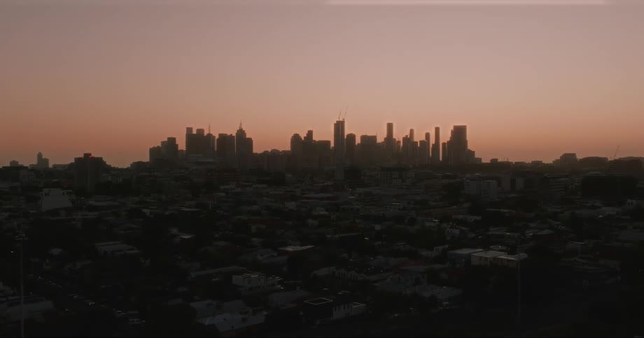 The sun is setting on the city