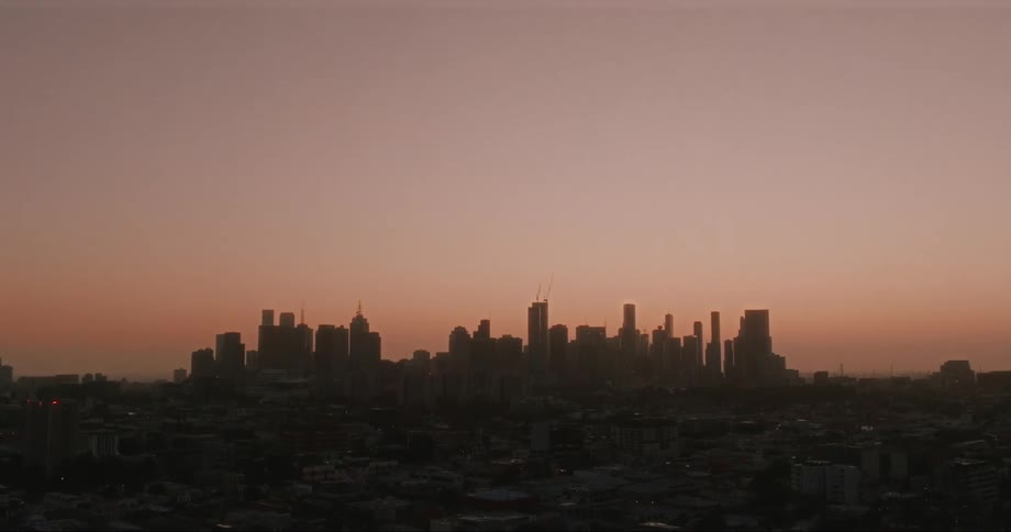 The sun is setting on the city