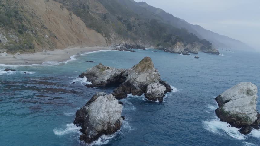 The mountains are on the shoreline