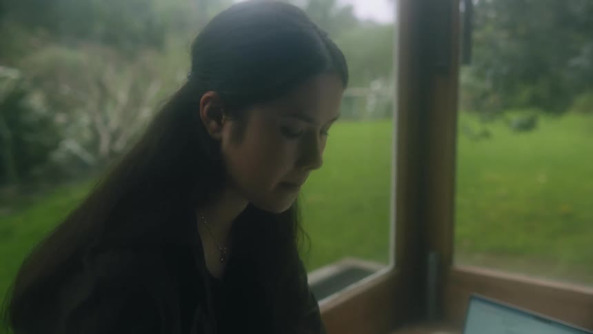 The view is of a portrait of a young woman
