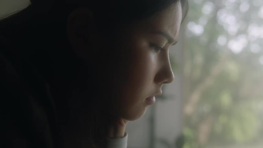 The view is of a portrait of a teenager in the day time